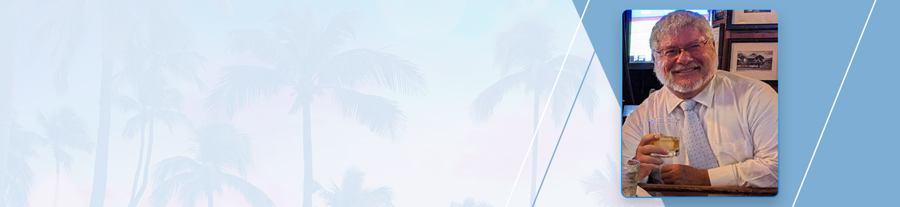 Attorney Michael Jeffrey Kessle with palm tree artwork in the background